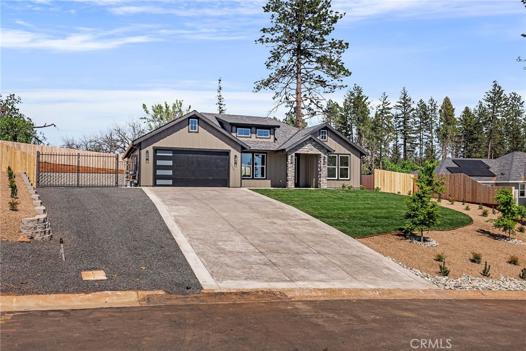 1528 Forest Paradise, CA 95969 - Photo 7 of 49 a front view of a house with a garden