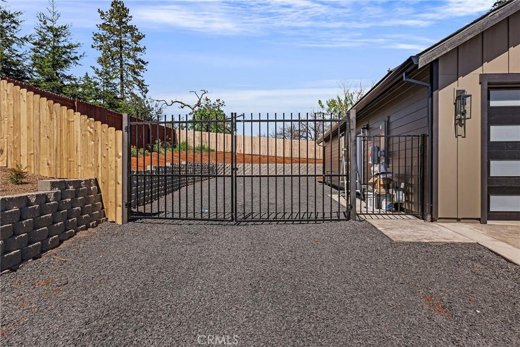 1528 Forest Paradise, CA 95969 - Photo 8 of 49 a view of a black gate of a house