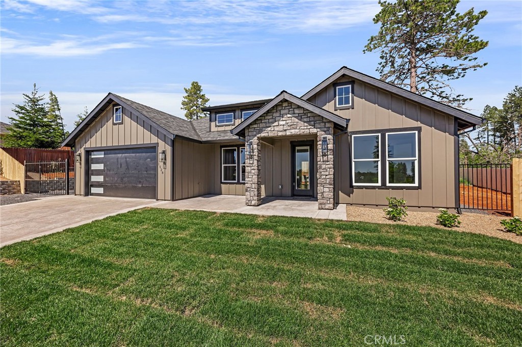 1528 Forest Paradise, CA 95969 - Photo 9 of 49 a front view of a house with a yard