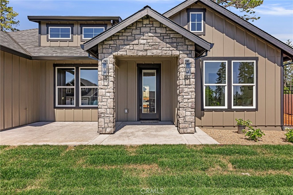1528 Forest Paradise, CA 95969 - Photo 10 of 49 a front view of a house with a yard
