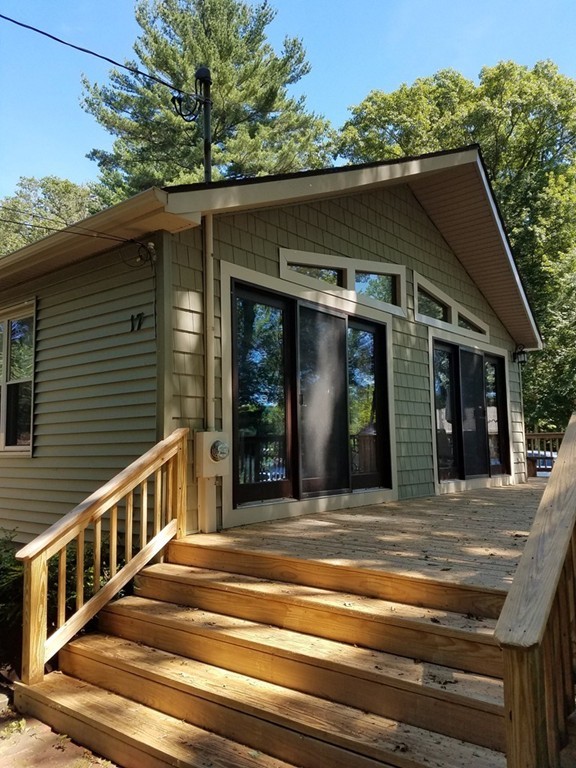 17 Irma Jones Road Sutton, MA 01590 - Photo 3 of 29 a view of a house with a balcony