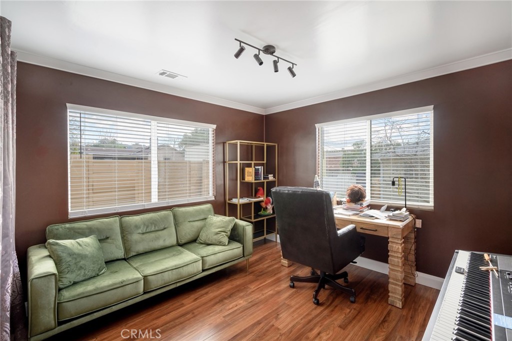 10604 Plainview Avenue Tujunga, CA 91042 - Photo 11 of 14 a view of a livingroom with workspace and a window