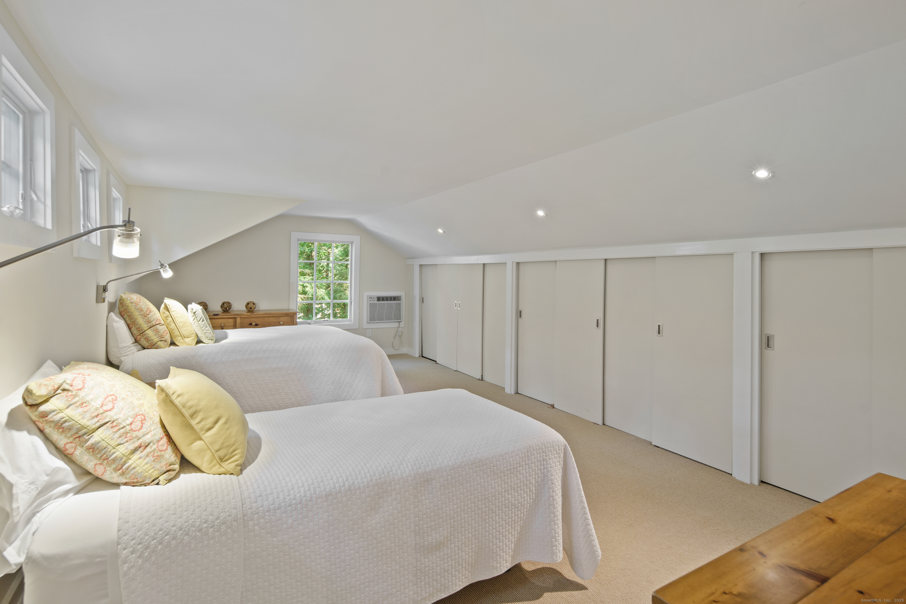 58 Kent Road Wilton, CT 06897 - Photo 13 of 19 a bedroom with a bed and a window