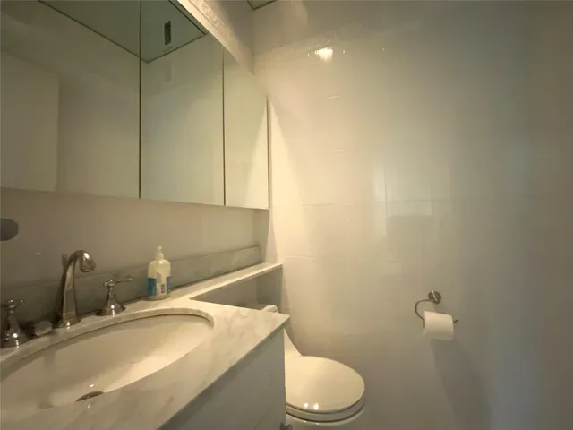 a bathroom with a sink and a toilet