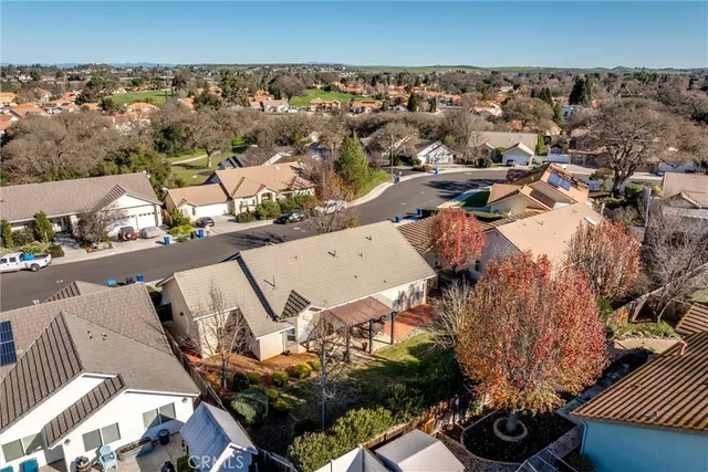 an aerial view of a house with a garden
