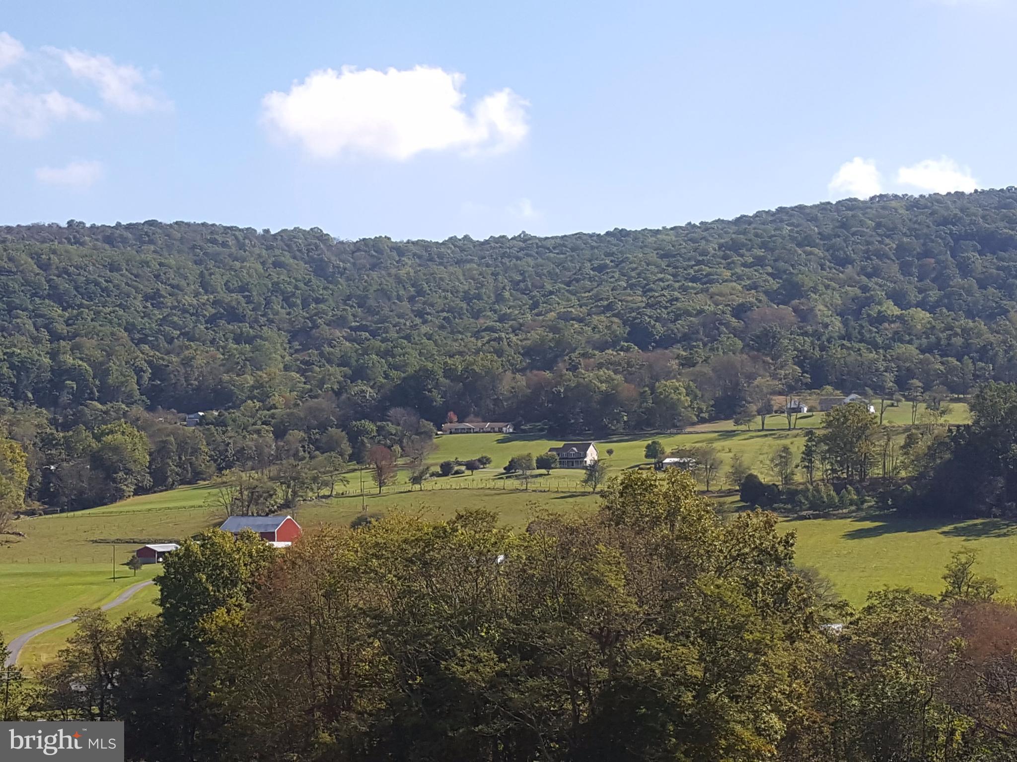 Middlepoint Road Myersville, MD 21773 - Photo 6 of 6 a view of a lake with mountains in the background