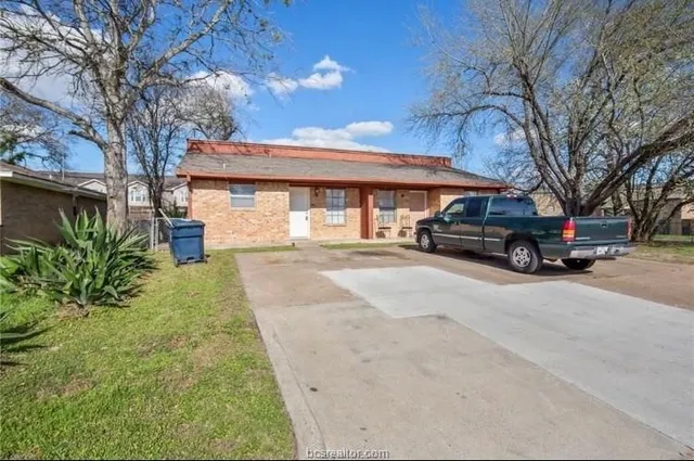 a car parked in front of a building