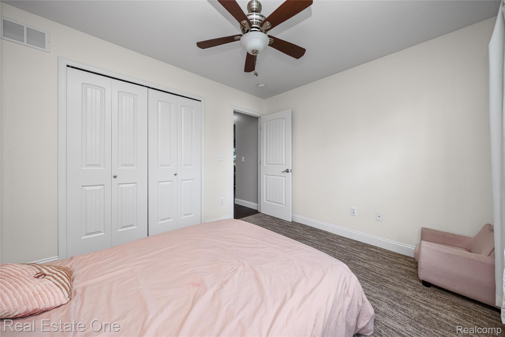 2479 Gibson Road Grand Blanc, MI 48439 - Photo 37 of 55 Interior room featuring textured carpet flooring, white baseboards, and neutral wall paint