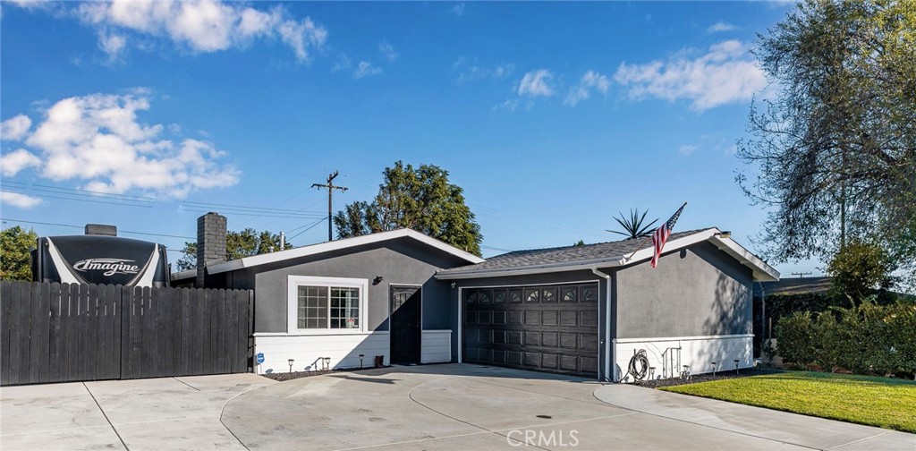 5535 Cleta Drive Riverside, CA 92505 - Photo 1 of 1 a front view of a house with a yard and garage