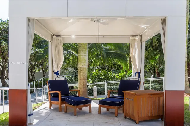 a outdoor living space with furniture and a potted plant