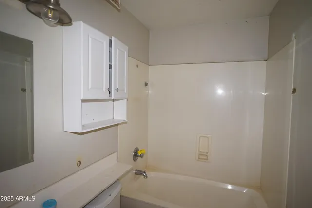 a view of a window in an empty room