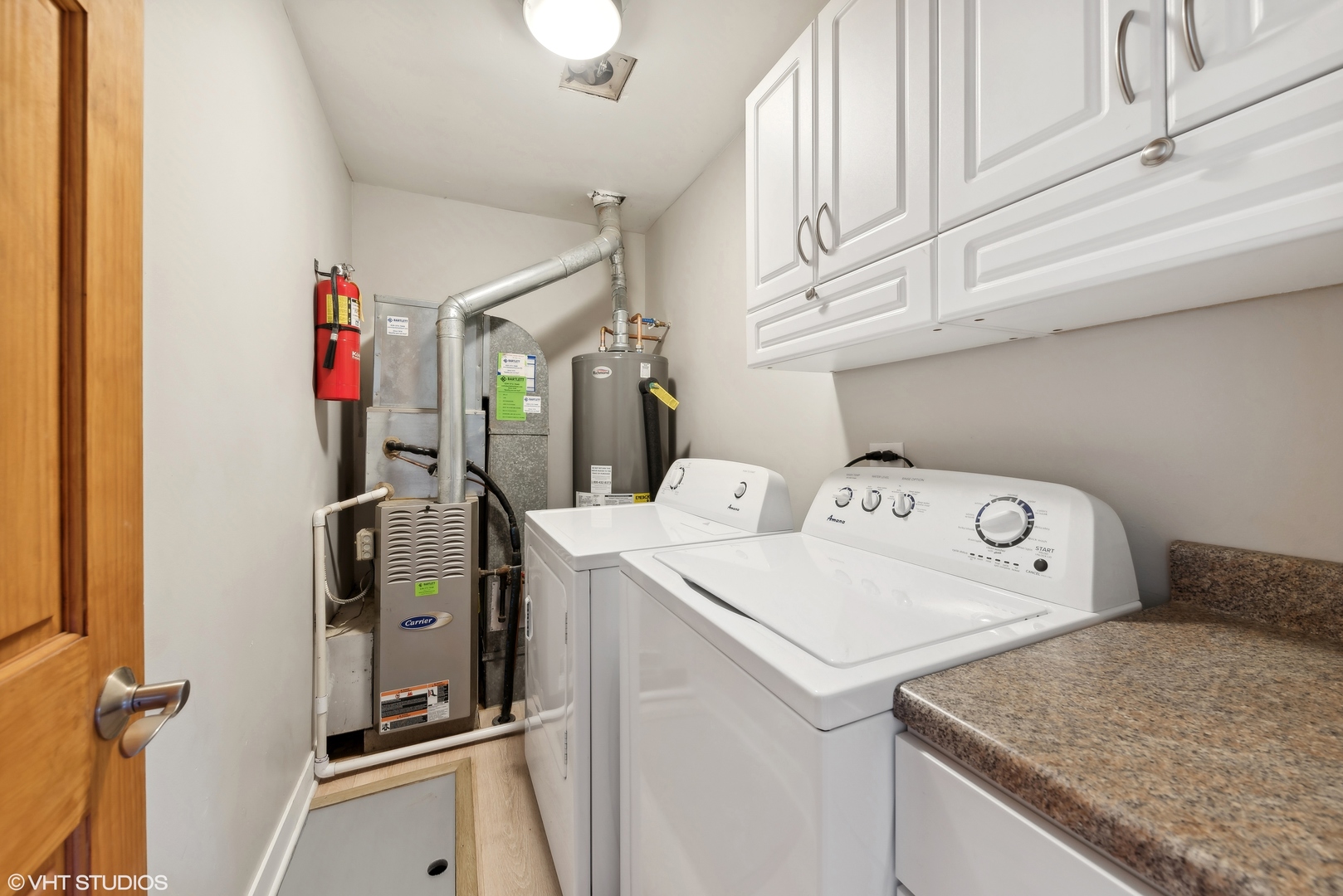 602 Forum Drive Roselle, IL 60172 - Photo 13 of 15 a utility room with dryer and washer