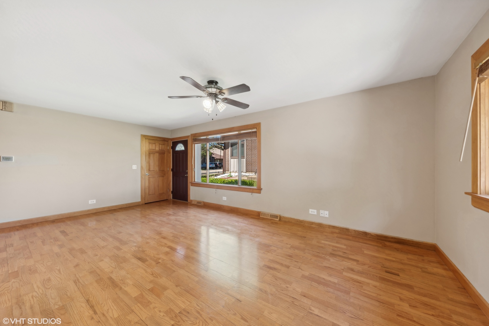 602 Forum Drive Roselle, IL 60172 - Photo 4 of 15 a view of an empty room with a window