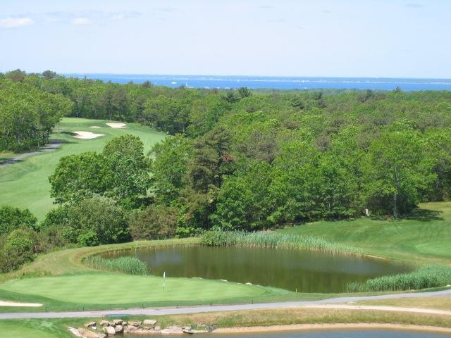 143 Shore Road Bourne, MA 02532 - Photo 34 of 35 a view of a lake with a yard