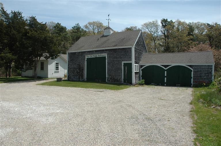143 Shore Road Bourne, MA 02532 - Photo 4 of 35 a house with a outdoor space