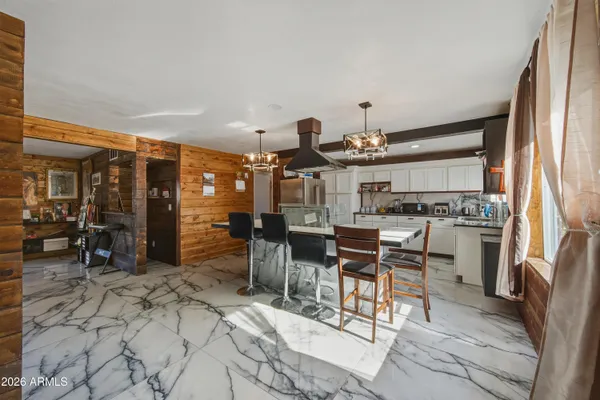 a view of a dining room kitchen and a window