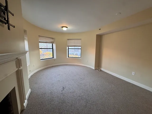 a view of a room that has a window in it