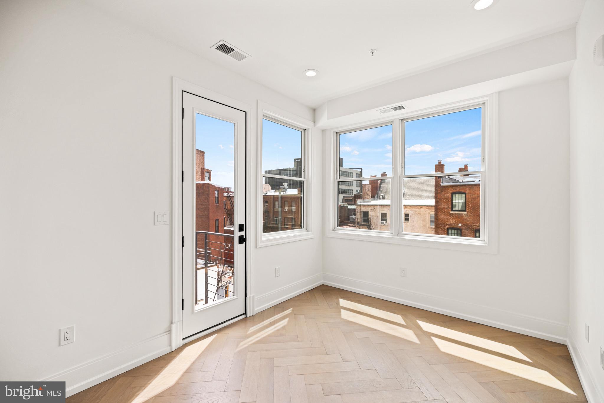 1709 21st Street Northwest, Unit 42 Washington, DC 20009 - Photo 16 of 21 a view of an empty room with a window