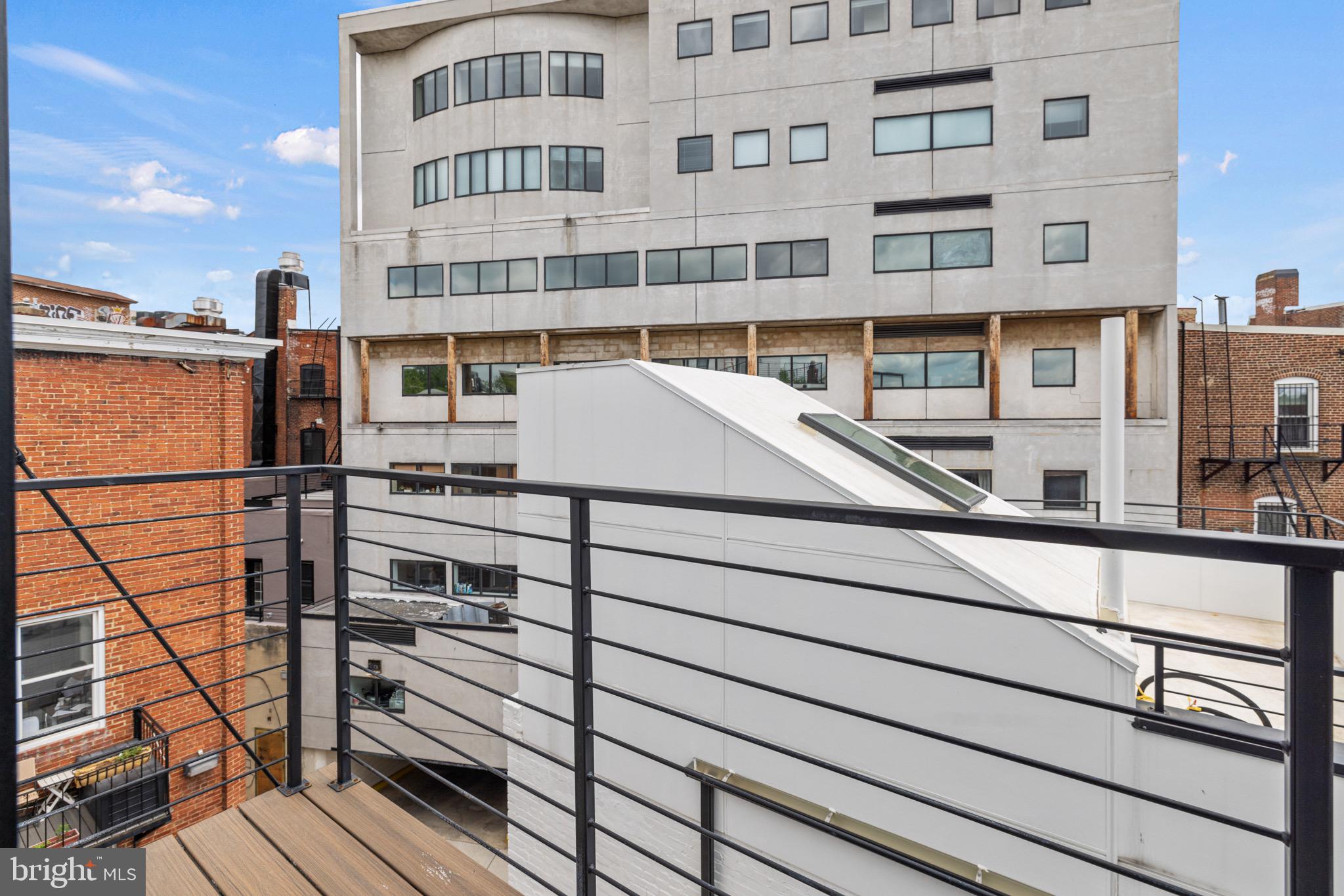 1709 21st Street Northwest, Unit 42 Washington, DC 20009 - Photo 20 of 21 a view of a building from a balcony