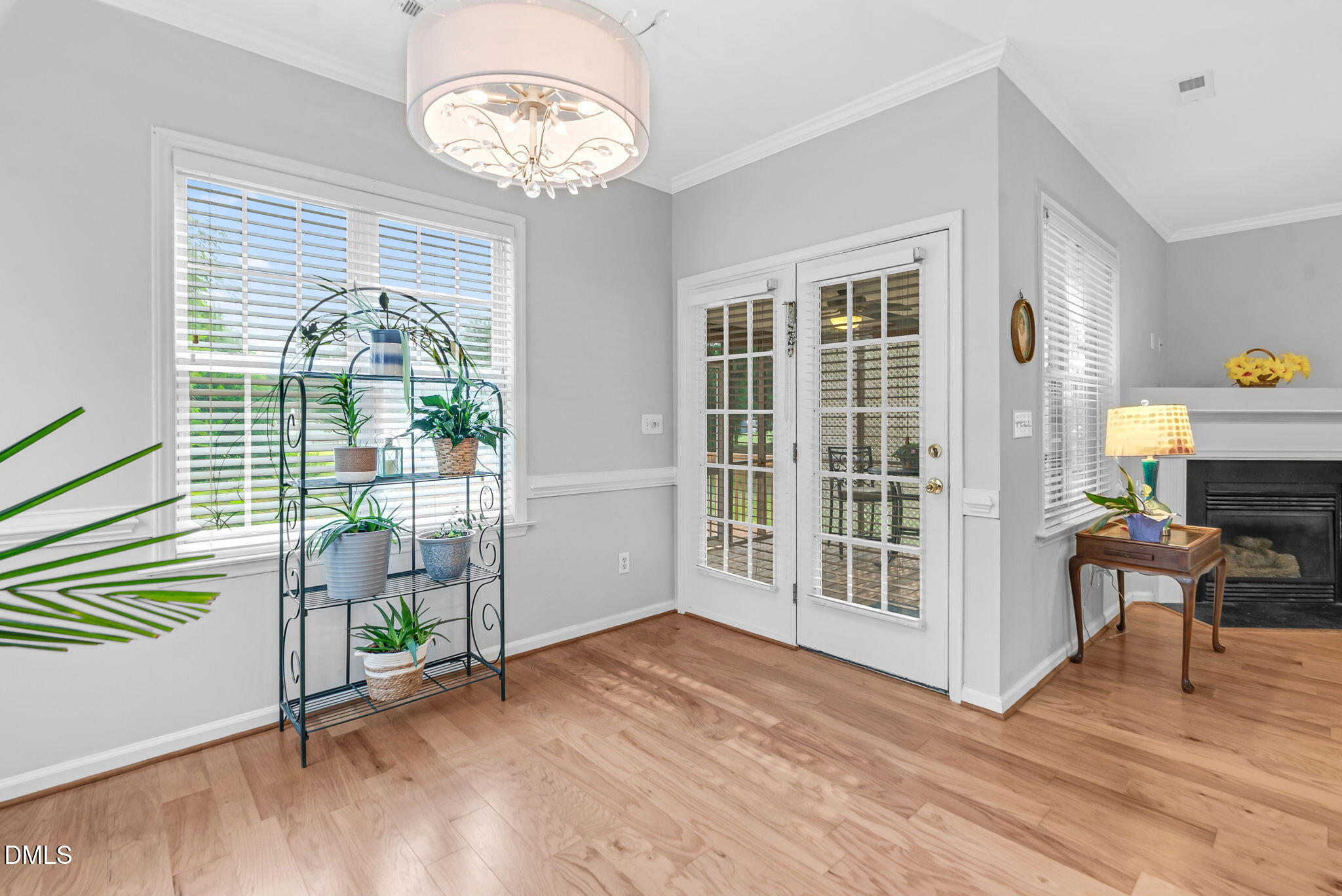 5512 Grand Traverse Drive Raleigh, NC 27604 - Photo 21 of 62 a view of livingroom with furniture wooden floor and windows