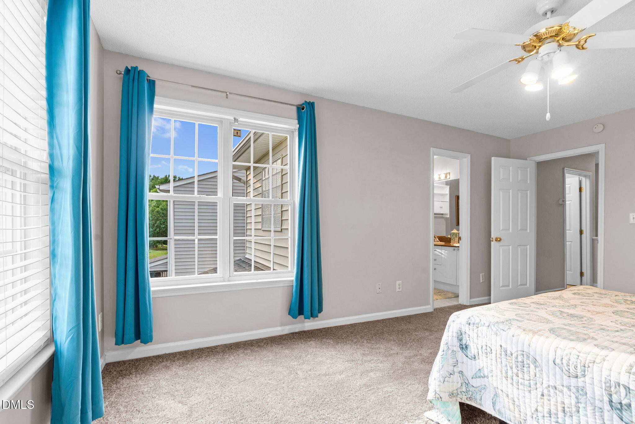 5512 Grand Traverse Drive Raleigh, NC 27604 - Photo 31 of 62 a bedroom with a bed and a window