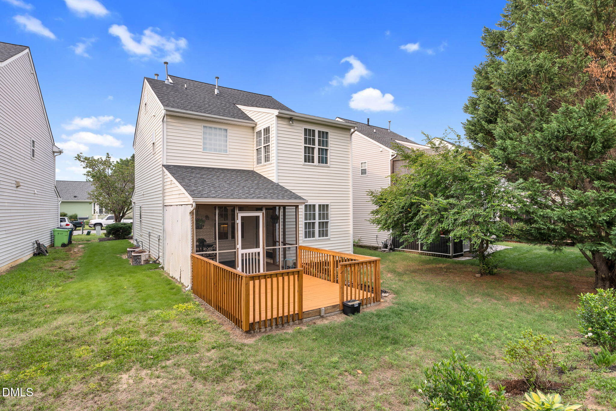 5512 Grand Traverse Drive Raleigh, NC 27604 - Photo 46 of 62 a view of a house with a yard and deck