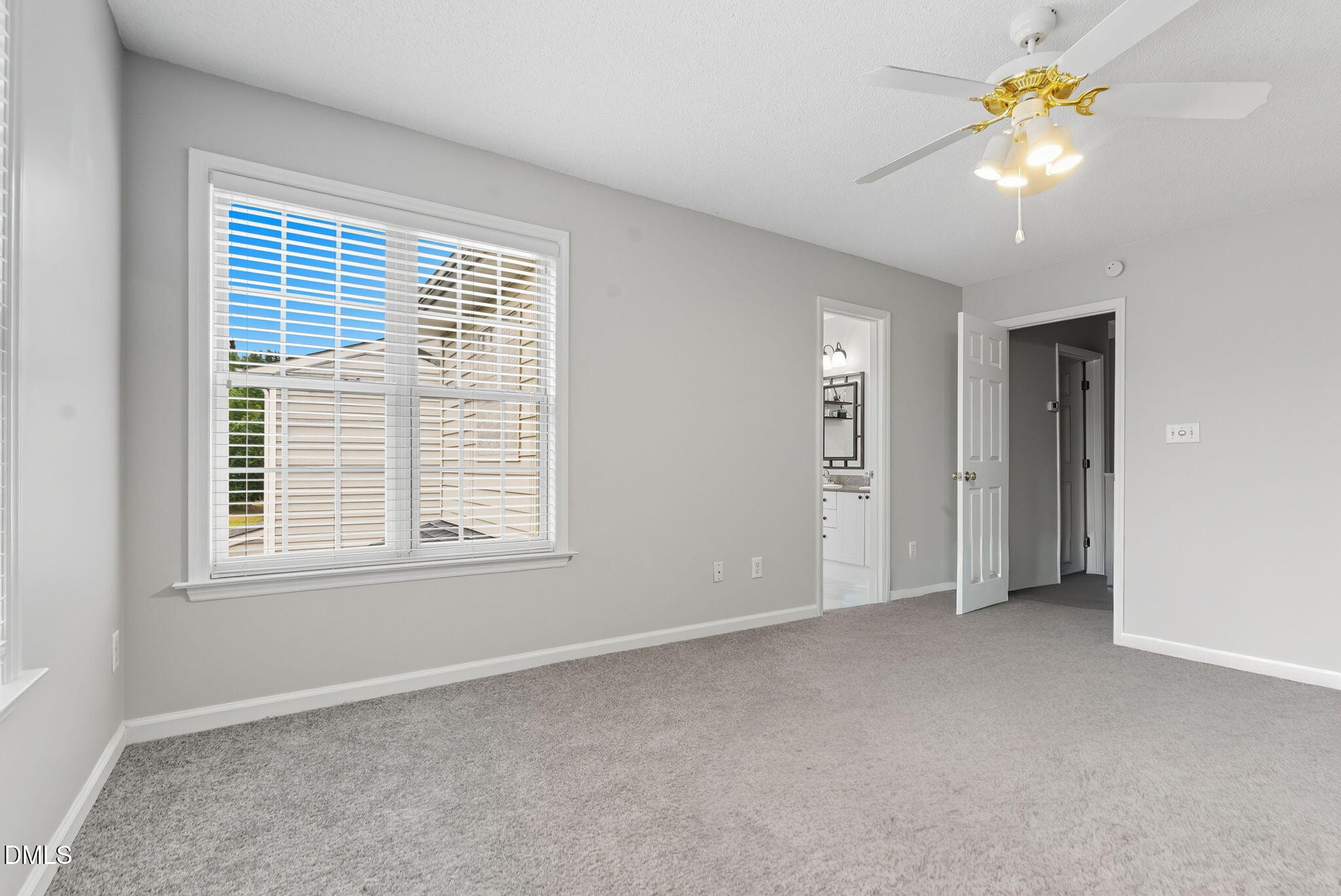 5512 Grand Traverse Drive Raleigh, NC 27604 - Photo 6 of 62 a view of an empty room with a window