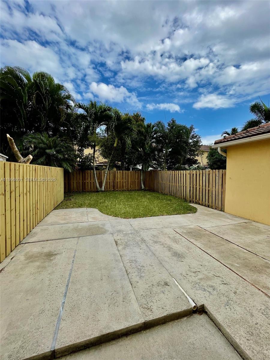 24651 Southwest 110th Avenue Homestead, FL 33032 - Photo 12 of 26 a view of backyard with green space
