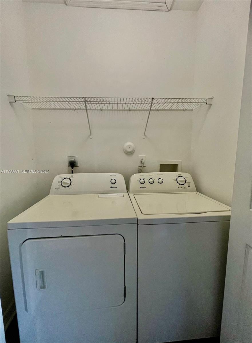 24651 Southwest 110th Avenue Homestead, FL 33032 - Photo 18 of 26 a utility room with dryer and washer