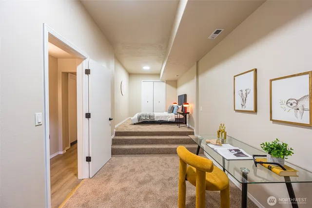a view of a dining room with furniture