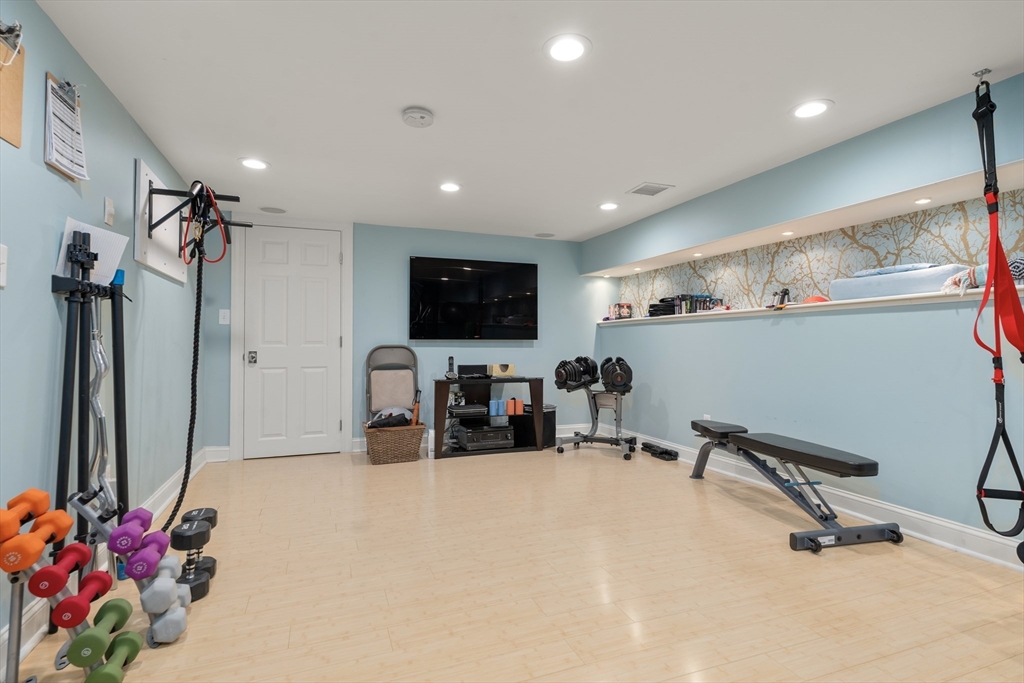 118 Sylvan Road Needham, MA 02492 - Photo 26 of 38 a view of a room with gym equipment