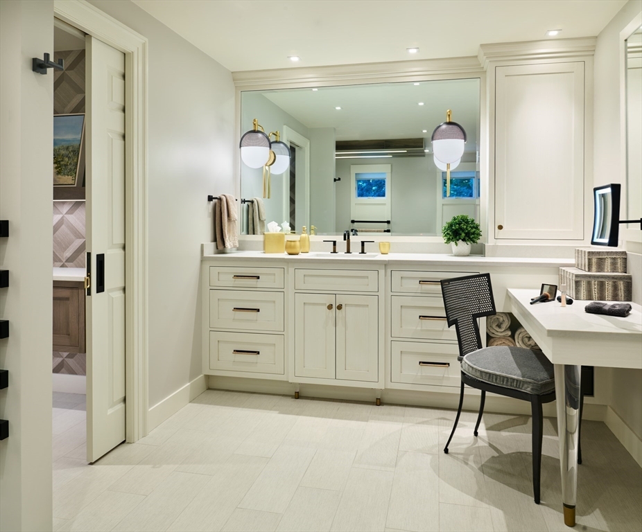 118 Sylvan Road Needham, MA 02492 - Photo 33 of 38 a spacious bathroom with a granite countertop sink a mirror and a shower