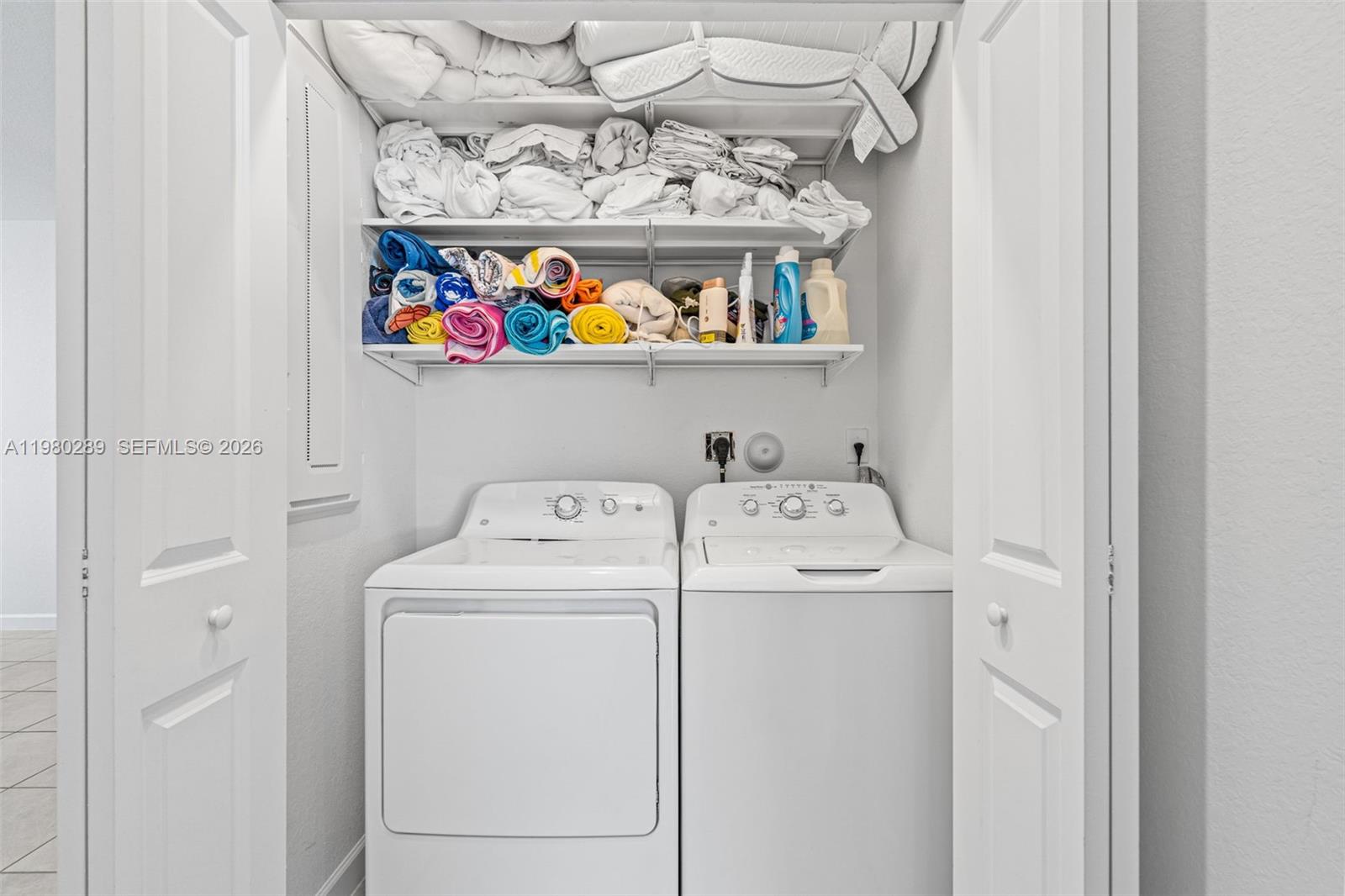 12731 Southwest 213th Street Miami, FL 33177 - Photo 32 of 41 a utility room with dryer and washer