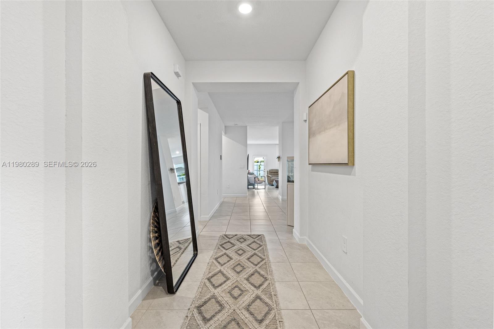 12731 Southwest 213th Street Miami, FL 33177 - Photo 5 of 41 a view of a hallway