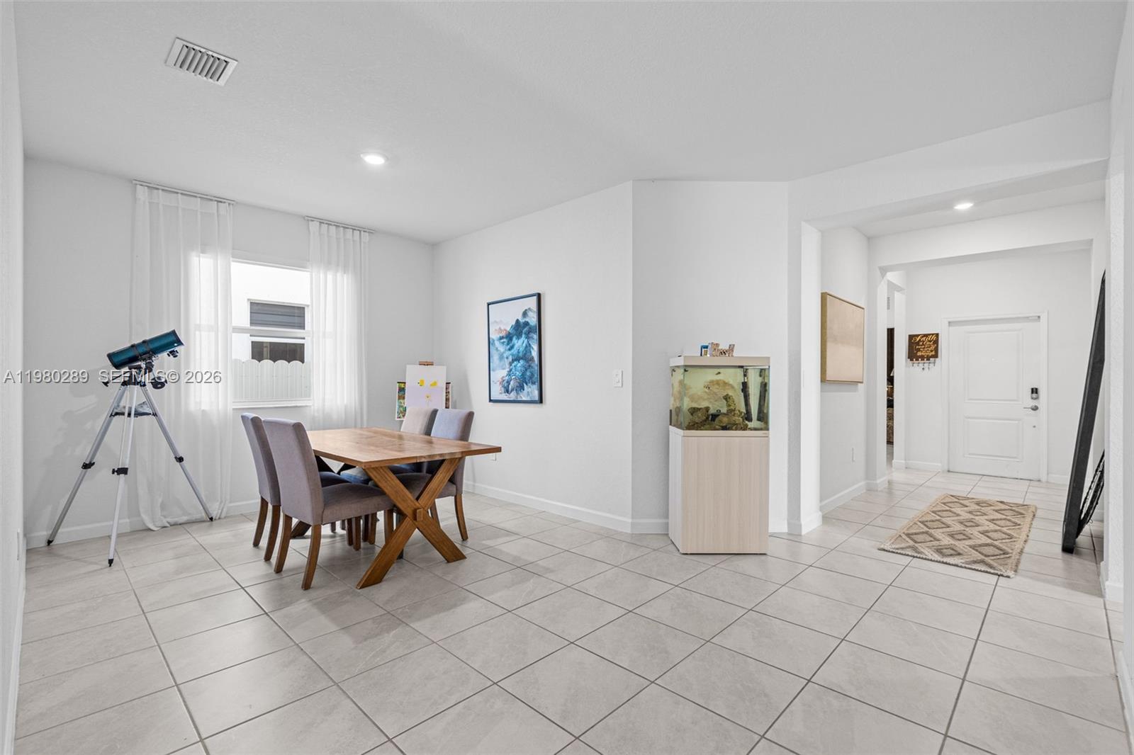 12731 Southwest 213th Street Miami, FL 33177 - Photo 7 of 41 a view of a dining room with furniture