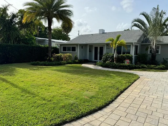 a view of a house with a swimming pool