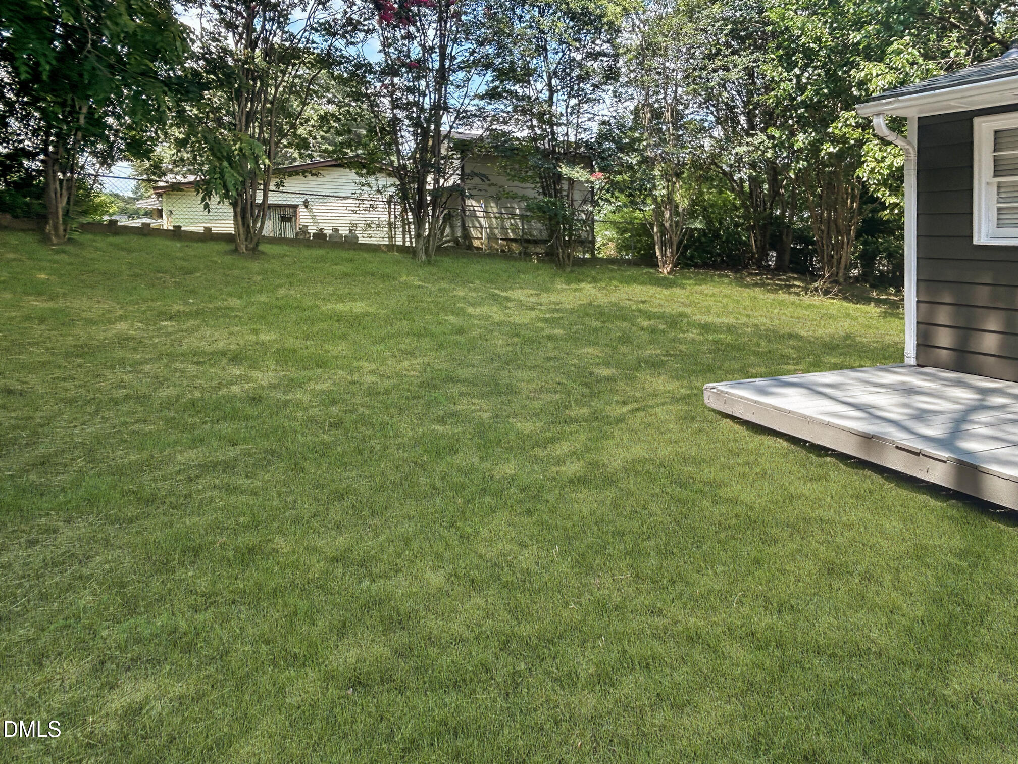 845 Newcombe Road Raleigh, NC 27610 - Photo 25 of 25 Exterior back with grass