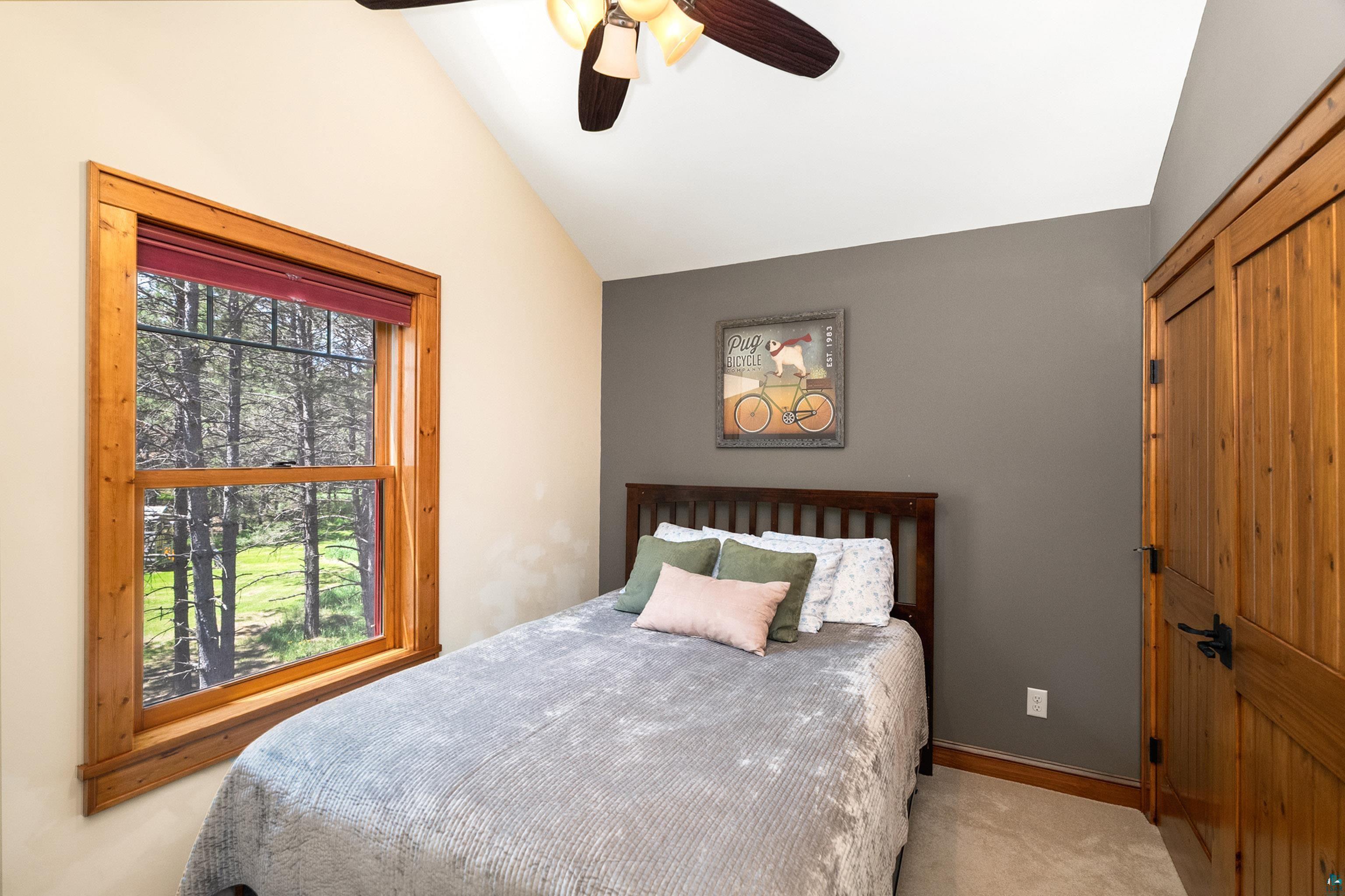75 East Stark Road Esko, MN 55733 - Photo 33 of 87 Room featuring a vaulted ceiling and a ceiling fan with integrated lighting