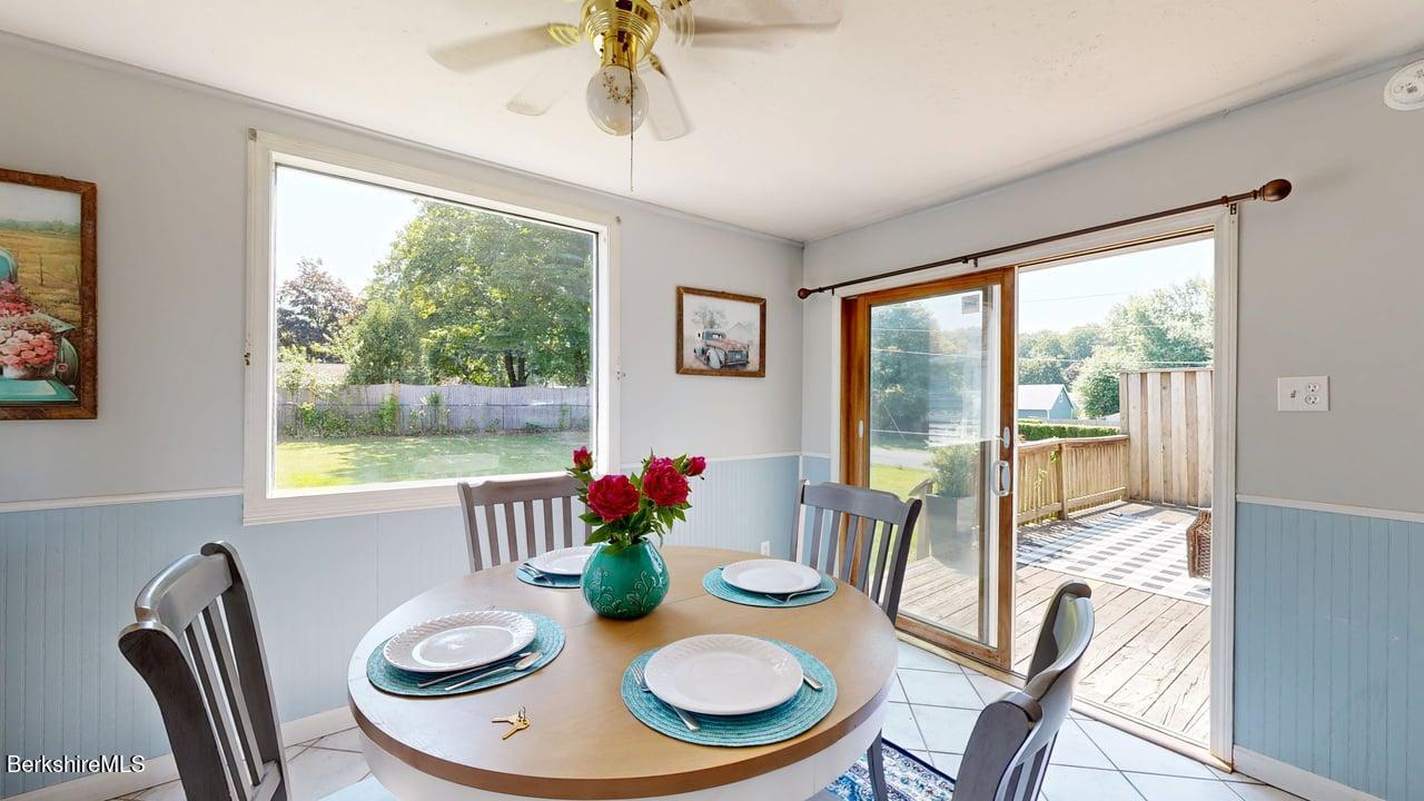 36 Dalton Division Road Dalton, MA 01226 - Photo 12 of 35 a view of a dining room with furniture a chandelier and wooden floor