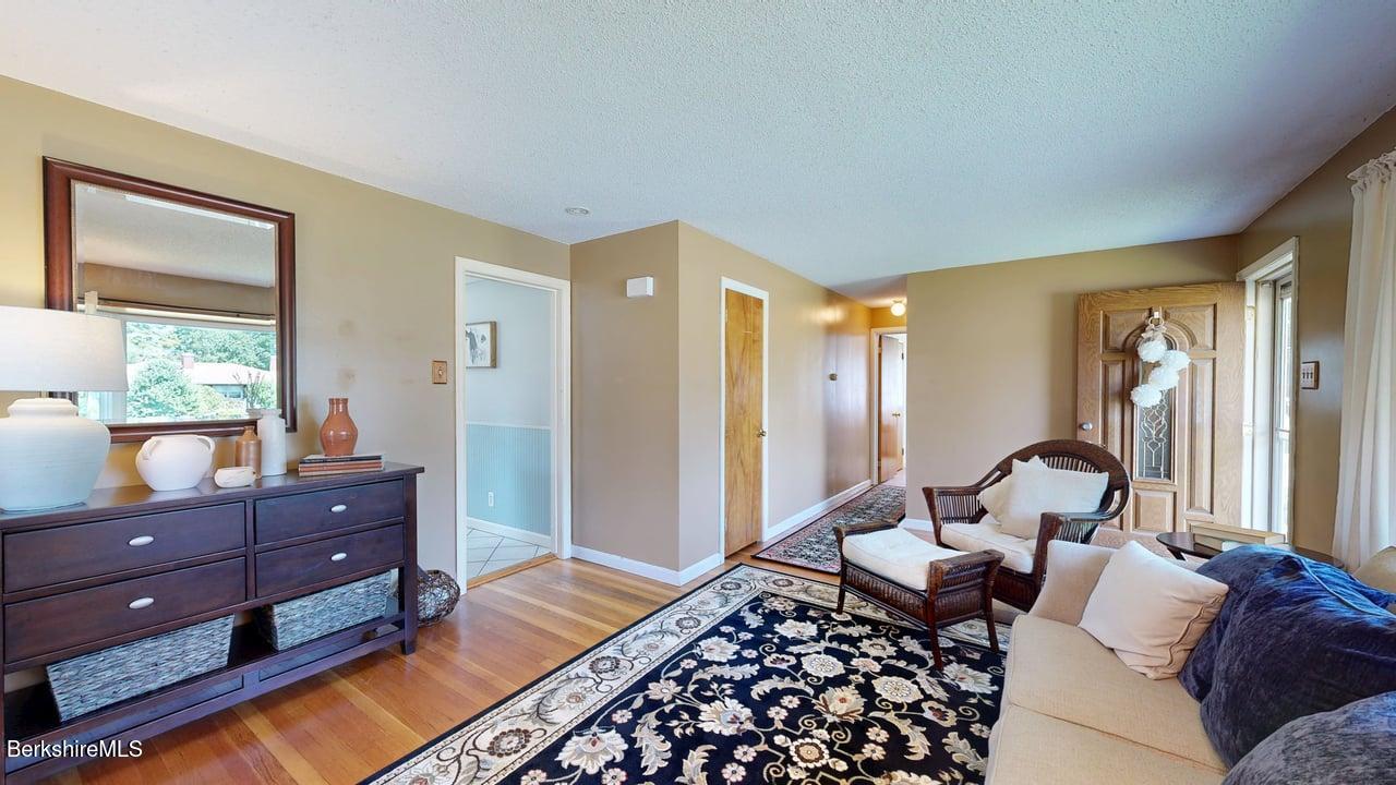 36 Dalton Division Road Dalton, MA 01226 - Photo 18 of 35 a living room with furniture and wooden floor