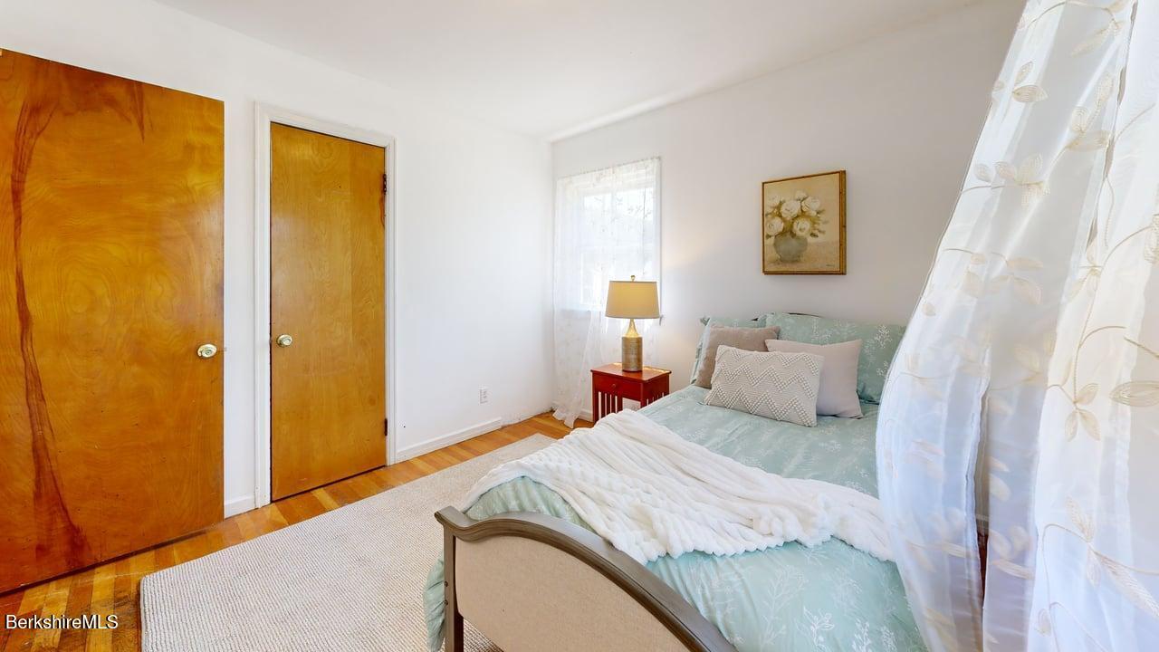 36 Dalton Division Road Dalton, MA 01226 - Photo 20 of 35 a bedroom with a bed and a window