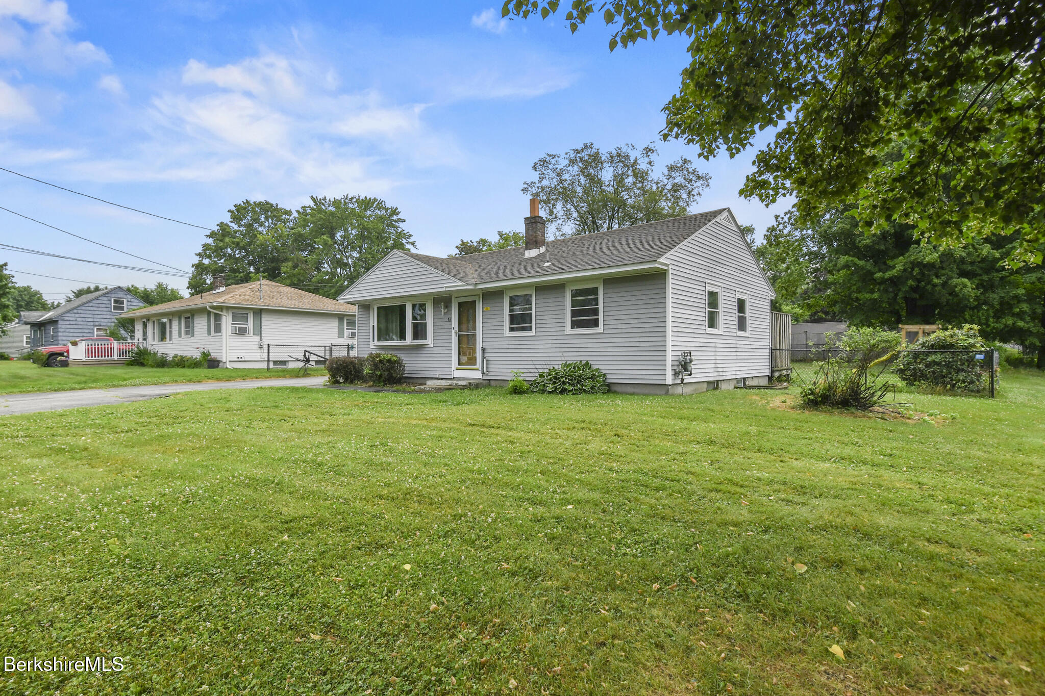 36 Dalton Division Road Dalton, MA 01226 - Photo 2 of 35 a front view of house with yard and green space