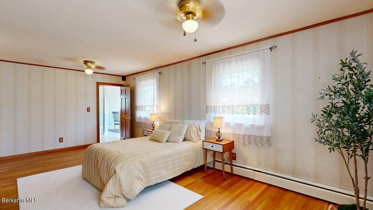 36 Dalton Division Road Dalton, MA 01226 - Photo 22 of 35 a bedroom with a bed and a window with the outer view