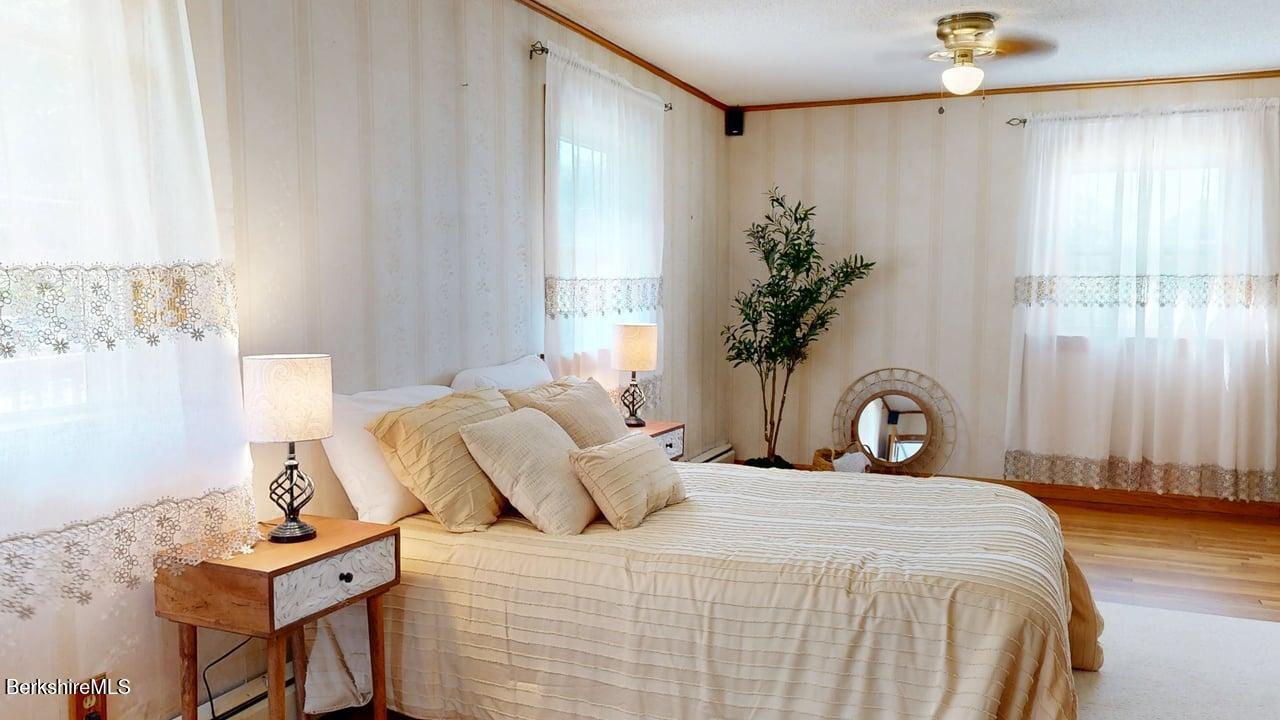 36 Dalton Division Road Dalton, MA 01226 - Photo 24 of 35 a bedroom with a bed and a window