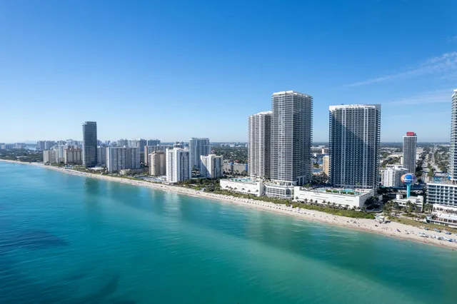 a view of a city with tall buildings
