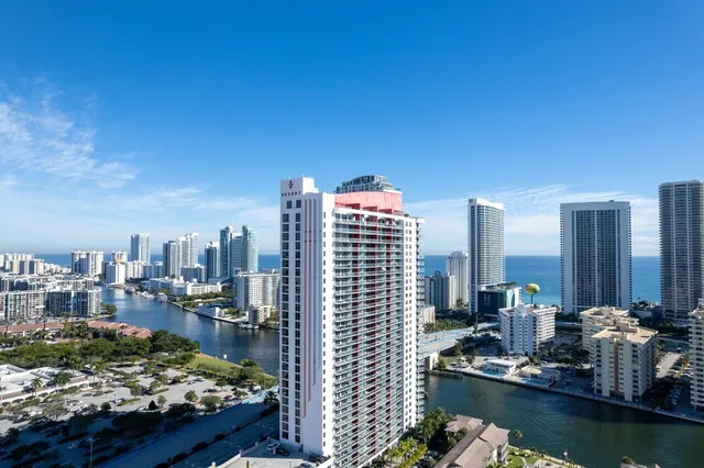 a view of a city with tall buildings