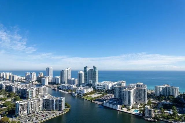 a view of a city with tall buildings