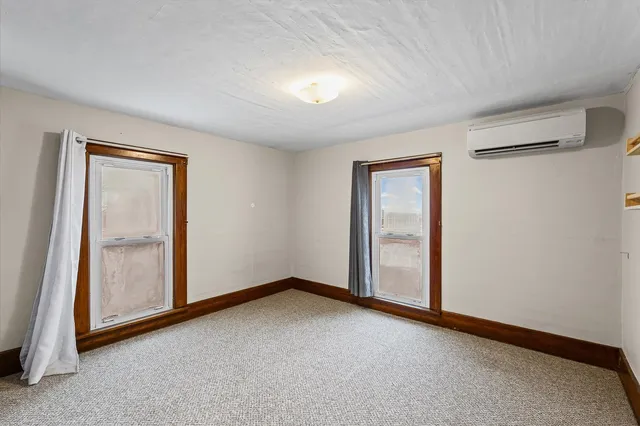 an empty room with closet