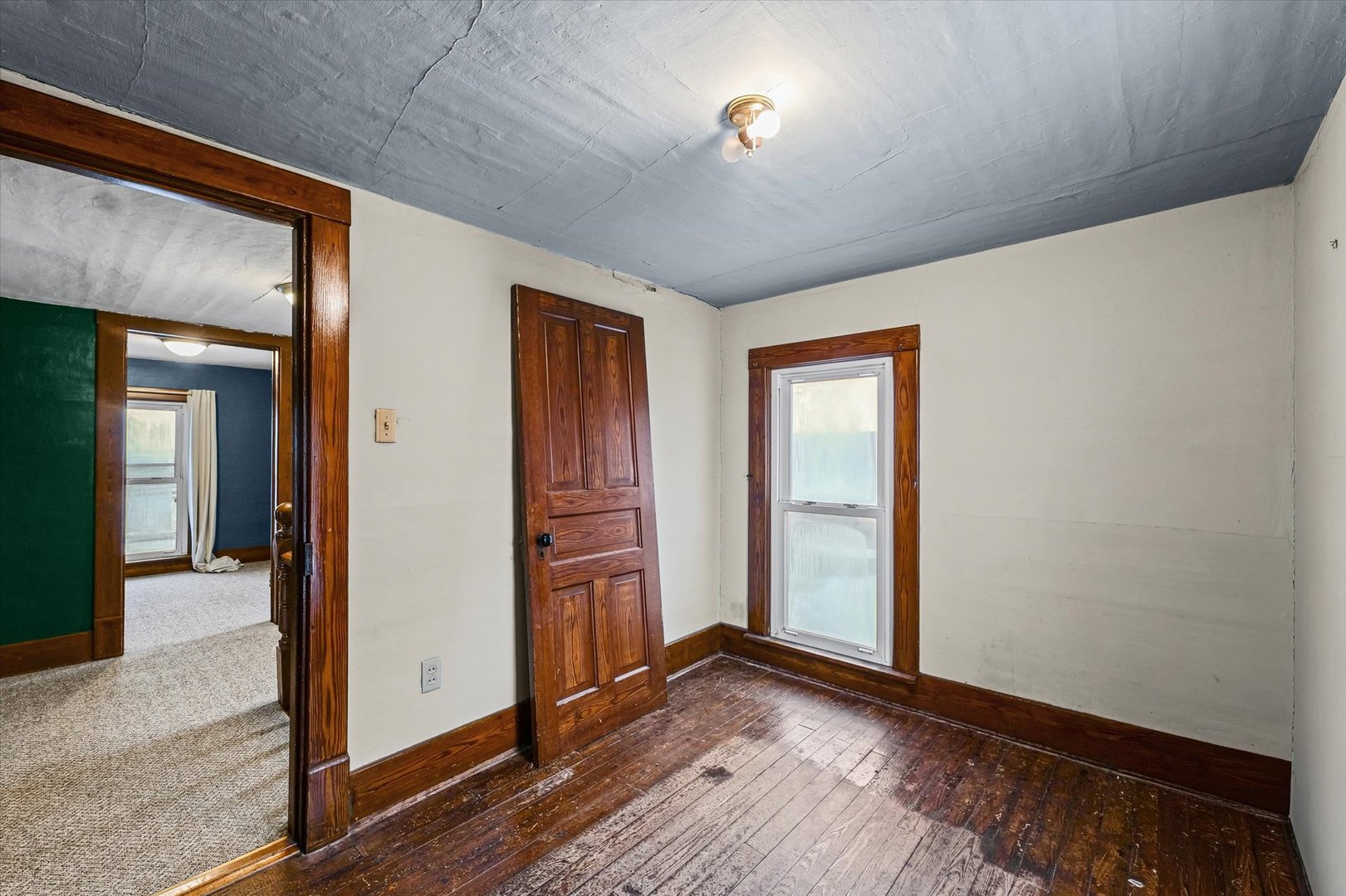 1471 East 100th Road North Rankin, IL 60960 - Photo 29 of 39 an empty room with wooden floor and windows
