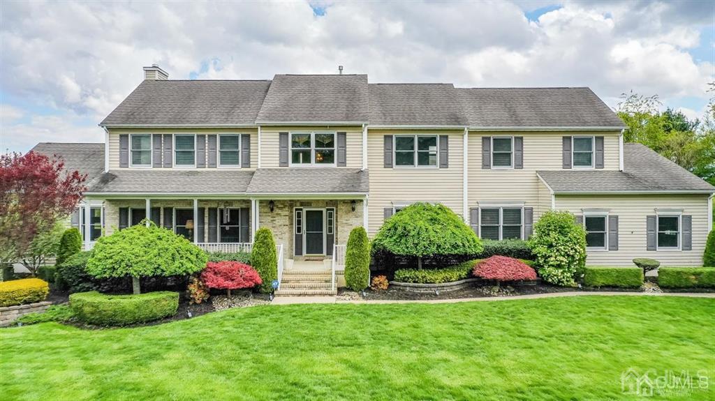 55 Rues Road Cream Ridge, NJ 08514 - Photo 1 of 67 a front view of a house with a garden and plants